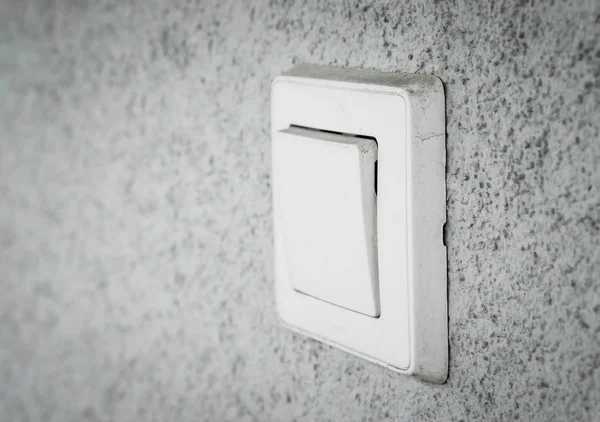 Zbliżenie f włącznik światła zamontowany na ścianie — Zdjęcie stockowe