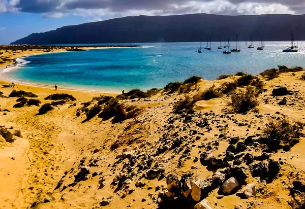 Beautiful scenery of a beach surrounded by rock formations in Canary Islands, Spain — Stock Photo, Image