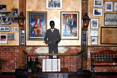 NEW ORLEANS, UNITED STATES - May 05, 2005: Wax statue of Louis Armstrong in Musee Conti Wax Museum in New Orleans. clipart