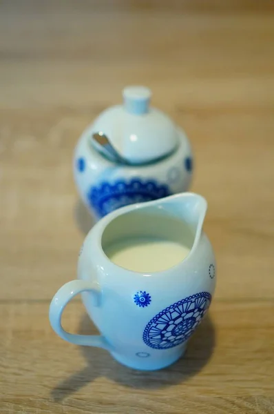 Vertical Closeup Shot Ceramic Jug Filled Milk Wooden Surface — Stock Photo, Image