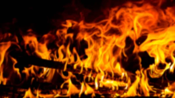 A blurred shot of a burning flame