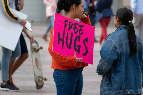 Malaga Spain Feb 2020 Millennial Woman Pink Sign Offering Free — стокове фото