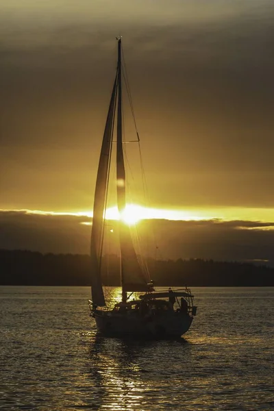 Vertical Shot Sailing Boat Ocean Sunset Stock Photo