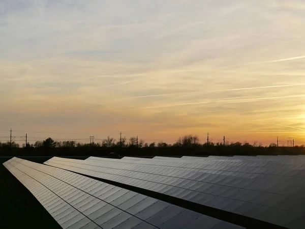 Solar panels generating power in the sunrise