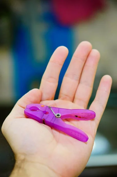 Purple Clothespin Put Person Palm Daytime — Stock Photo, Image