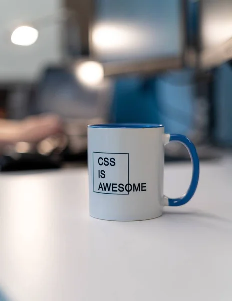 Vertical Shot Printed Text Css Awesome Mug Blurred Background — Stock Photo, Image