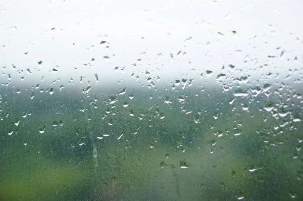 Primo Piano Sparato Gocce Acqua Una Superficie Vetro Sporca — Foto Stock