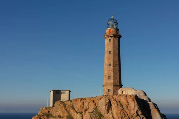 Lighthouse Cabo Vilan Rocks Sunlight Blue Sky Spain — Stock Photo, Image