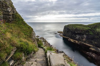 The famous Whaligoe Steps, a man-made stairway of 365 steps near Wick, Caithness, Scotland clipart