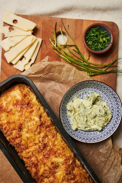 Loaf Cheese Bread Herbal Butter Wooden Plate Herbs — Stock Photo, Image