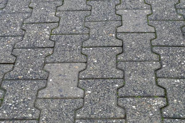 Een Hoge Hoek Close Van Grijze Geplaveide Grond Met Patronen — Stockfoto