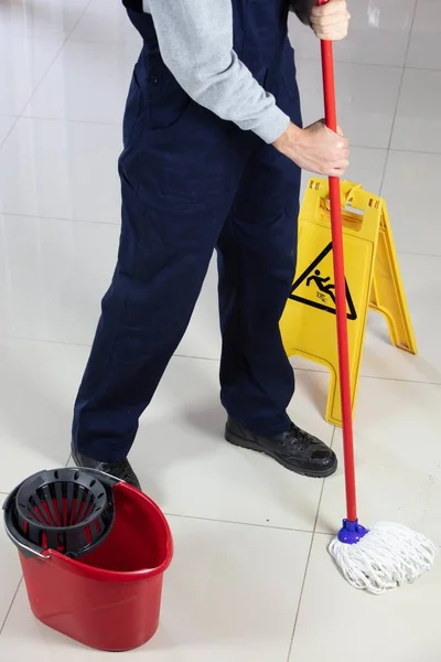 Person Cleaning Floor Red Mop Yellow Caution Wet Floor Sign — Stock Photo, Image