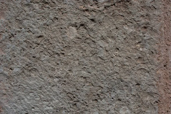 Küçük Kraterlere Sahip Beton Bir Duvarın Yakın Plan Çekimi — Stok fotoğraf