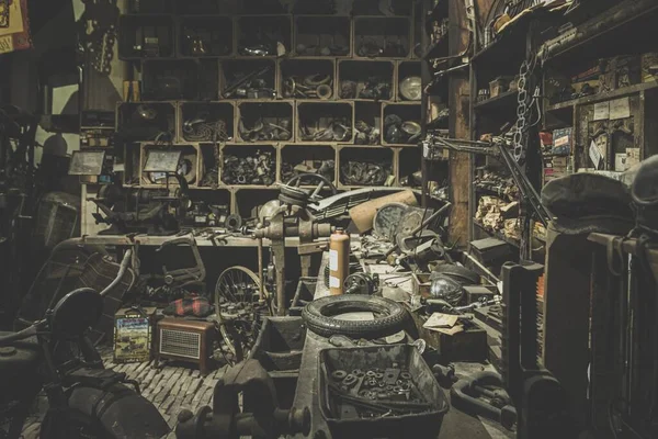 Old Dark Auto Repair Shop Wheels Spare Parts — Stock Photo, Image