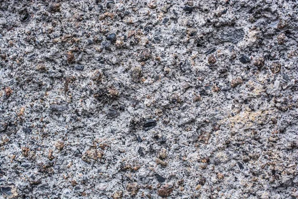 Närbild Texturerad Betongvägg Med Små Stenar — Stockfoto