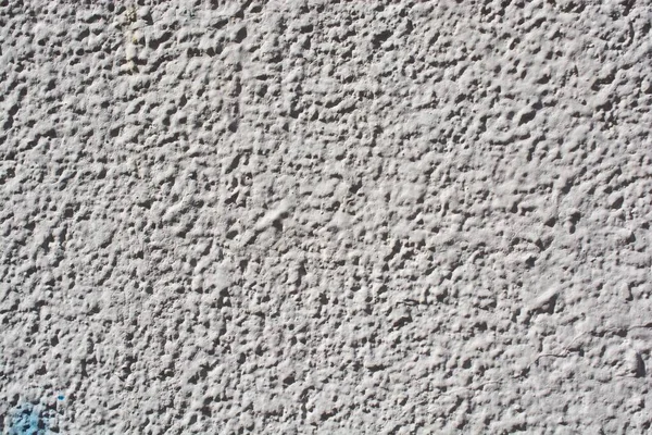 Detailní Záběr Texturované Betonové Stěny Natřené Šedě Slunečného Dne — Stock fotografie