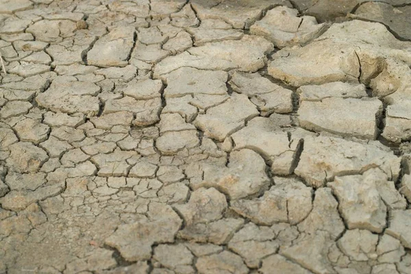 Eine Nahaufnahme Von Trockenem Boden Mit Rissen Perfekt Für Den — Stockfoto