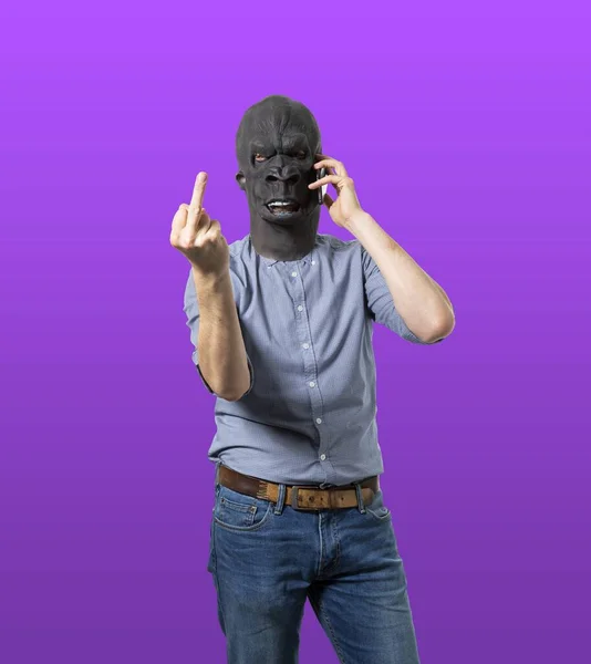 Male Black Mask Talking Phone Showing Middle Finger — Stock Photo, Image