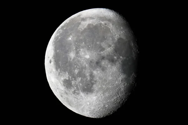 Waning Gibbous Moon . Taken with a Canon dslr and Canon EF-S Lens 250mm on a camera tripod.