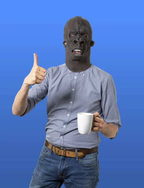 Male Black Angry Mask Holding White Cup Showing Sign — Stock Photo, Image