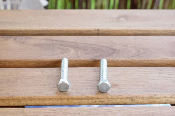 Closeup Shot Two Metal Screws Wooden Surface — Stock Photo, Image