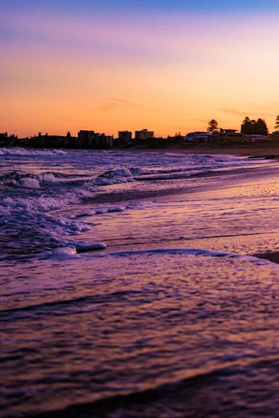 Beautiful Shot Silhouette Buildings Scenery Sunset Beach Clear Orange Sky — Stock Photo, Image