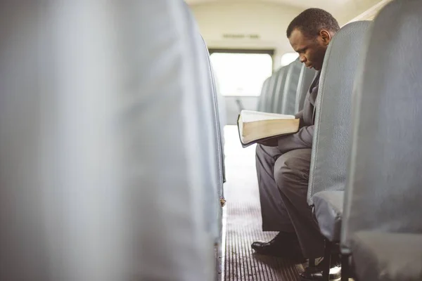 African American Male Sitting Bus Reading Bible — Stock Photo, Image
