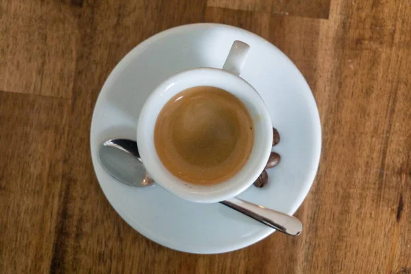 Tiro Ângulo Alto Uma Xícara Café Com Uma Colher Uma — Fotografia de Stock
