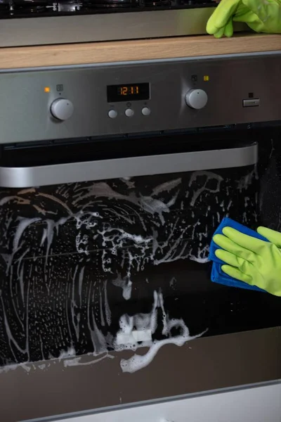 Closeup Person Gloves Disinfecting Oven Lights Coronavirus Concept — Stock Photo, Image