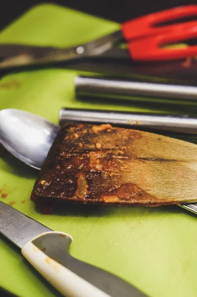 Greasy Burned Wooden Spatula Next Other Kitchen Tools — Stock Photo, Image