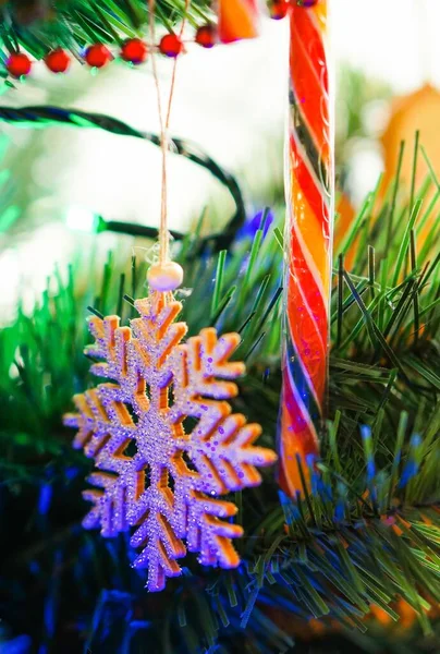 Closeup Vertical Shot Decorative Snowflake Hanging Christmas Tree Blurred Background — Stock Photo, Image