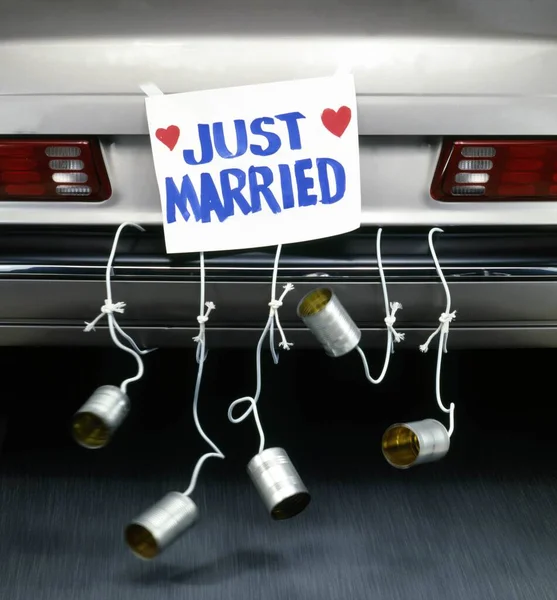 A vertical shot of a just married car - great for a background