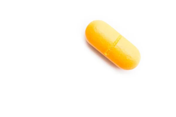 Closeup Shot Yellow Pill White Surface — Stock Photo, Image