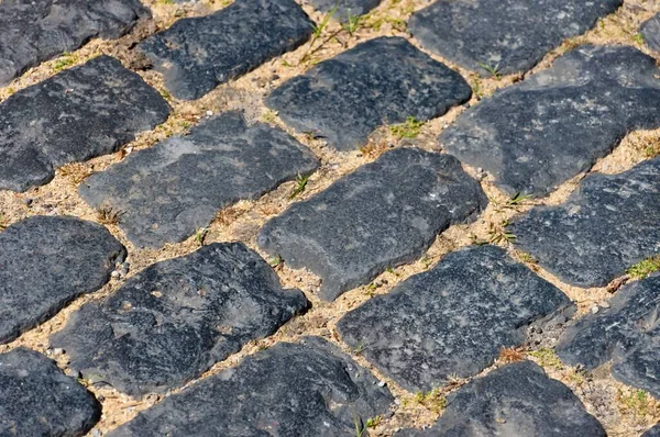 Closeup Cobblestones Covering Ground Sunlight Daytime — Stock Photo, Image