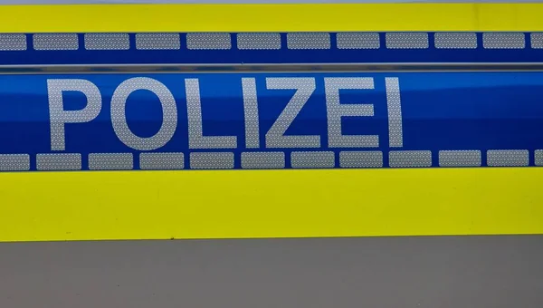 Närbild Polizei Polis Text Skriven Blå Bakgrund Ljuset — Stockfoto