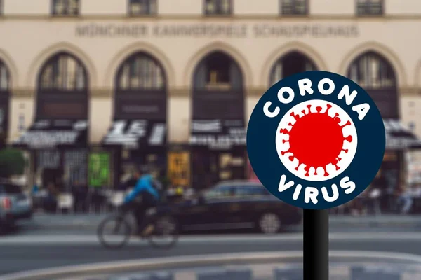 People on the street run the risk of getting infected with the coronavirus. Covid-19 concept in munich. Social isolation is demanded