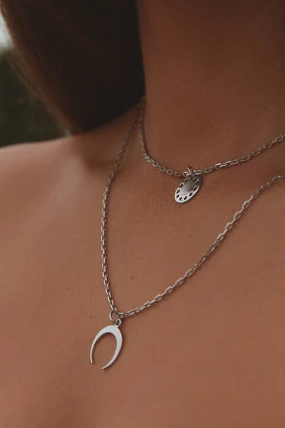 Vertical Closeup Shot Female Wearing Silver Necklace Beautiful Pendants — Stock Photo, Image