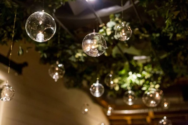 Low Angle Shot Spherical Glass Decorations Hung Ceiling Which Decorated — Stock Photo, Image