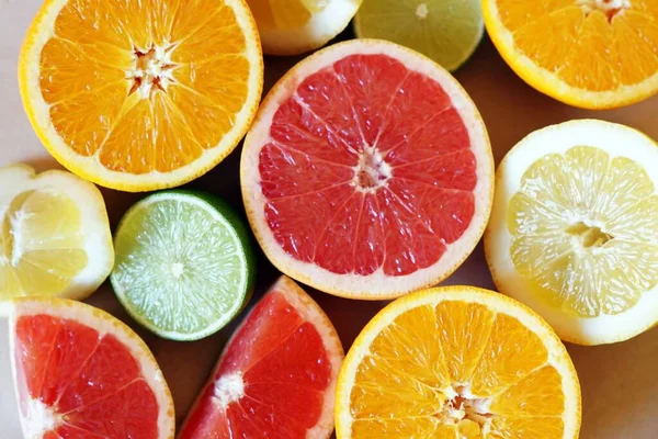 Closeup Shot Fresh Oranges Limes Grapefruits Table — Stock Photo, Image