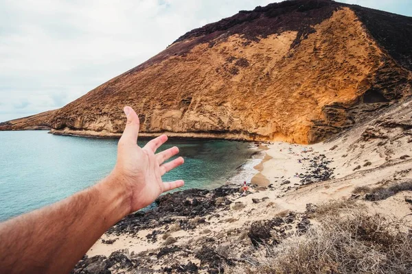 Point View Shot Male Hand Stretching Rocky Coastline Playa Amarilla — Stock Photo, Image