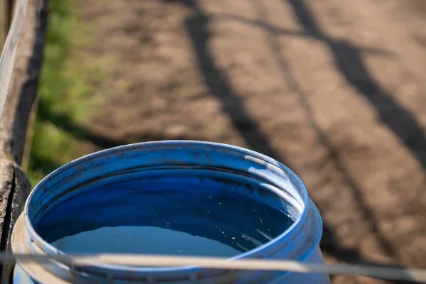 Closeup Open Blue Barrel Water Field — Stock Photo, Image