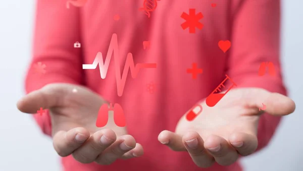 Man Holding Red Illustrated Medical Icons Healthcare Concept — Stock Photo, Image