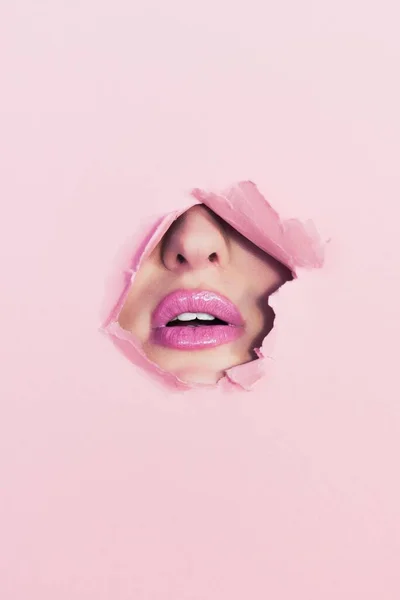 Closeup Vertical Shot Female Face Part Pink Torn Wall — Φωτογραφία Αρχείου