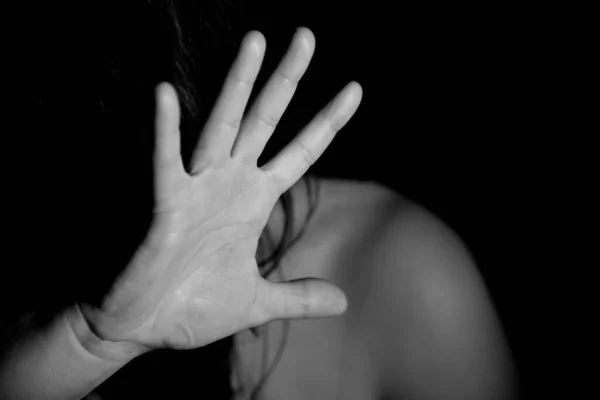 Greyscale Closeup Woman Covering Her Face Her Hand Lights Studio — Stock Photo, Image