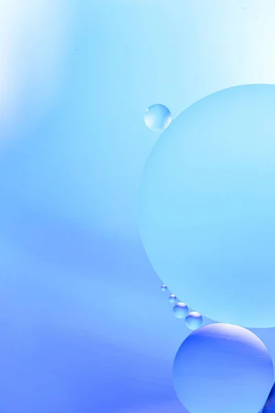 Een Verticale Grafische Illustratie Van Lichtblauwe Cirkels Een Blauwe Achtergrond — Stockfoto