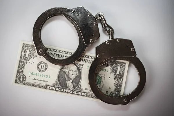 Closeup Shot Metal Handcuffs Dollars — Stock Photo, Image