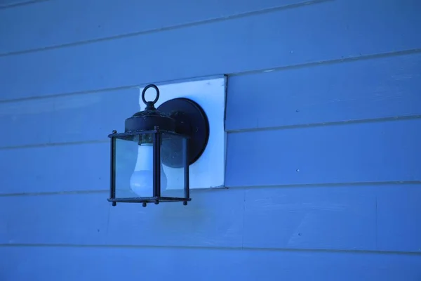 Closeup Shot Lamp Hanged Blue Wooden Wall — Stock Photo, Image