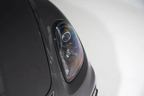 Closeup Headlight Black Luxury Car Isolated White Background Lights — Stock Photo, Image