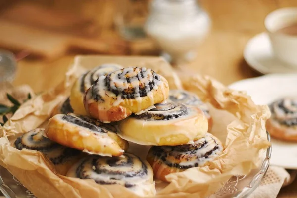 Closeup Picture Delicious Poppy Snail Pastries Sugar Glaze Wooden Table — Stock Photo, Image