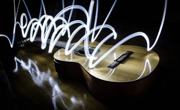 Гітара Красиве Світло Тривалою Експозицією Дерев Яній Поверхні — стокове фото